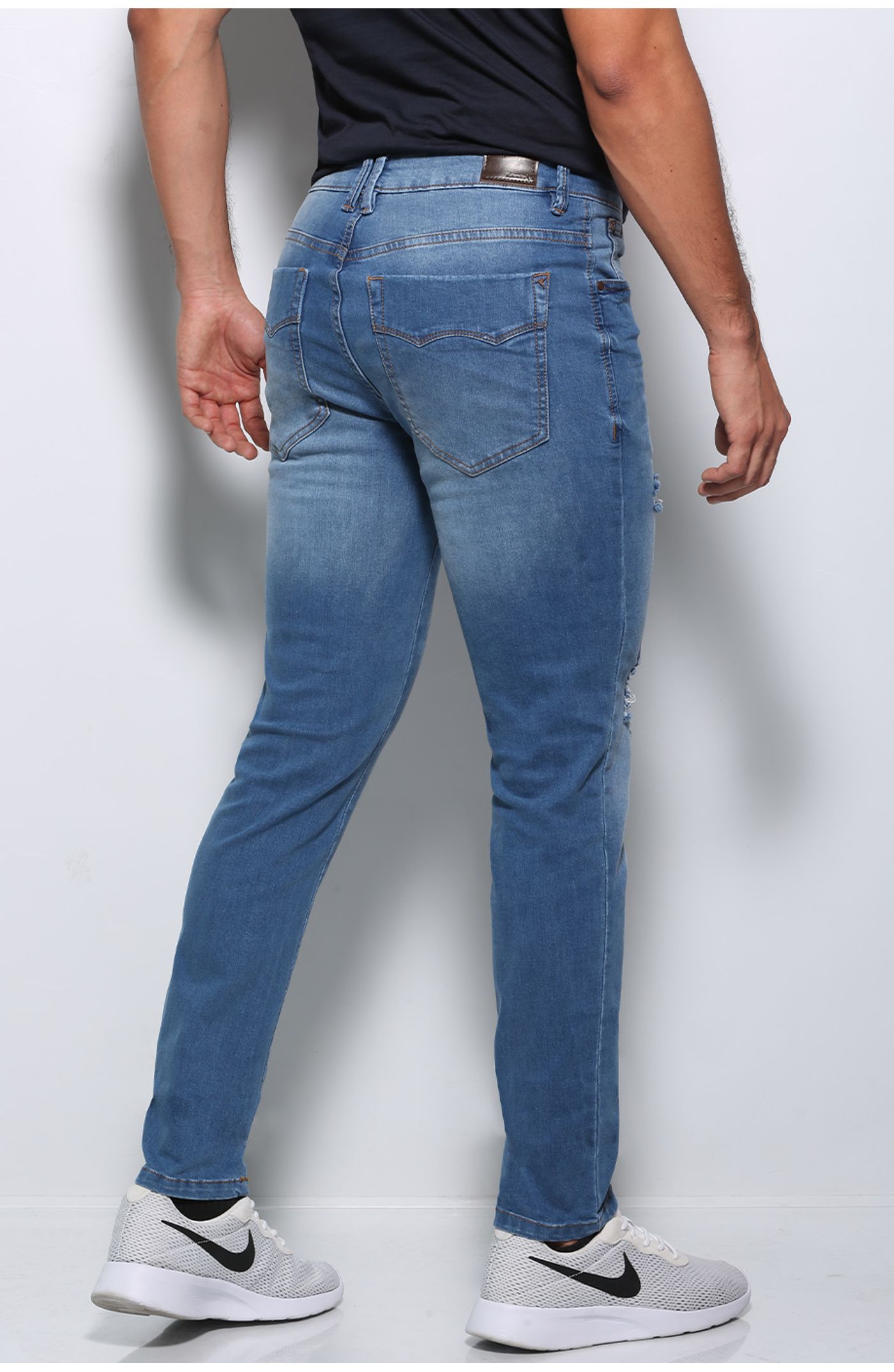 jeans con botas hombre